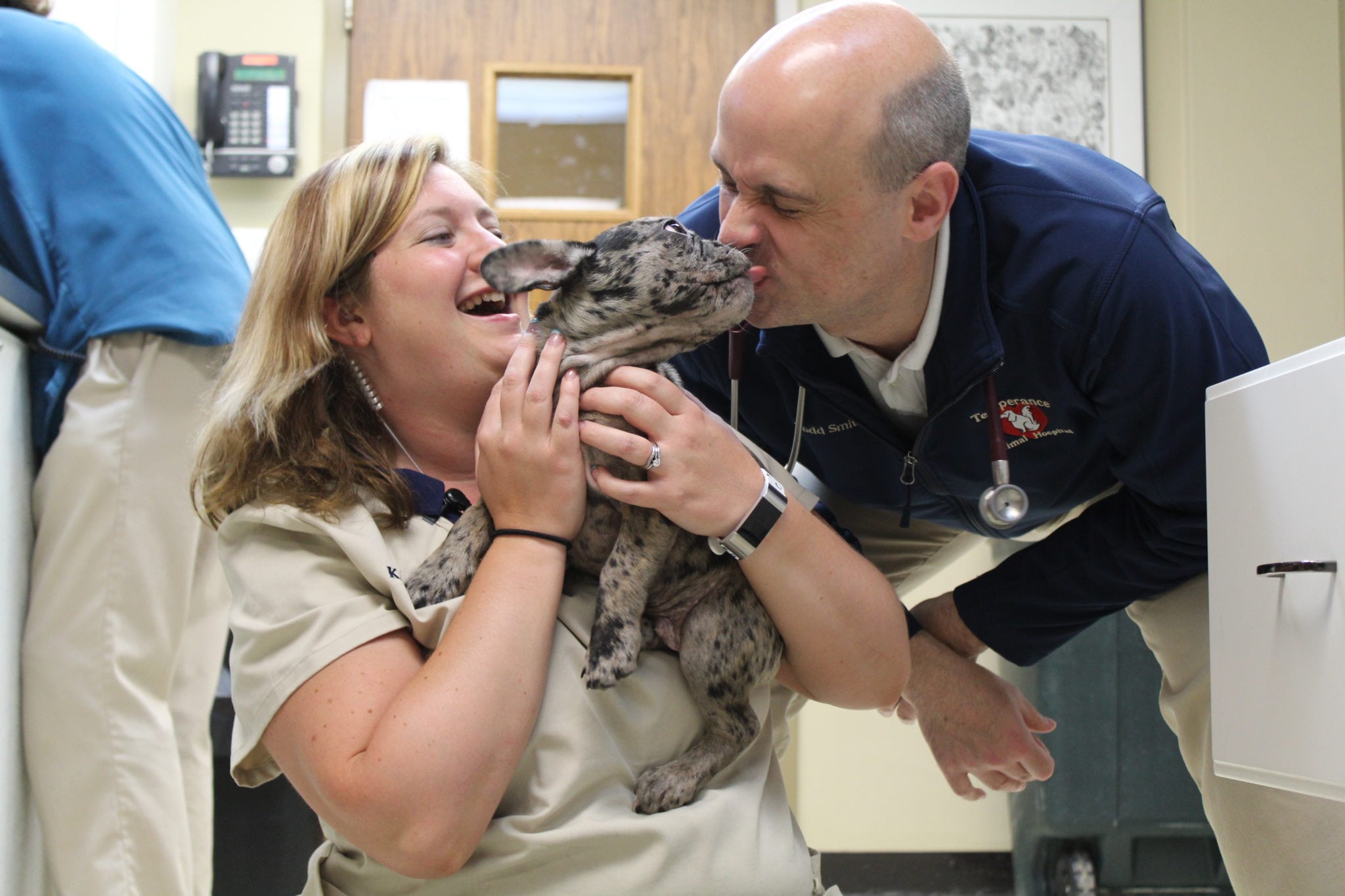 Our Photo Gallery in Temperance: Todd and Krystal with puppy